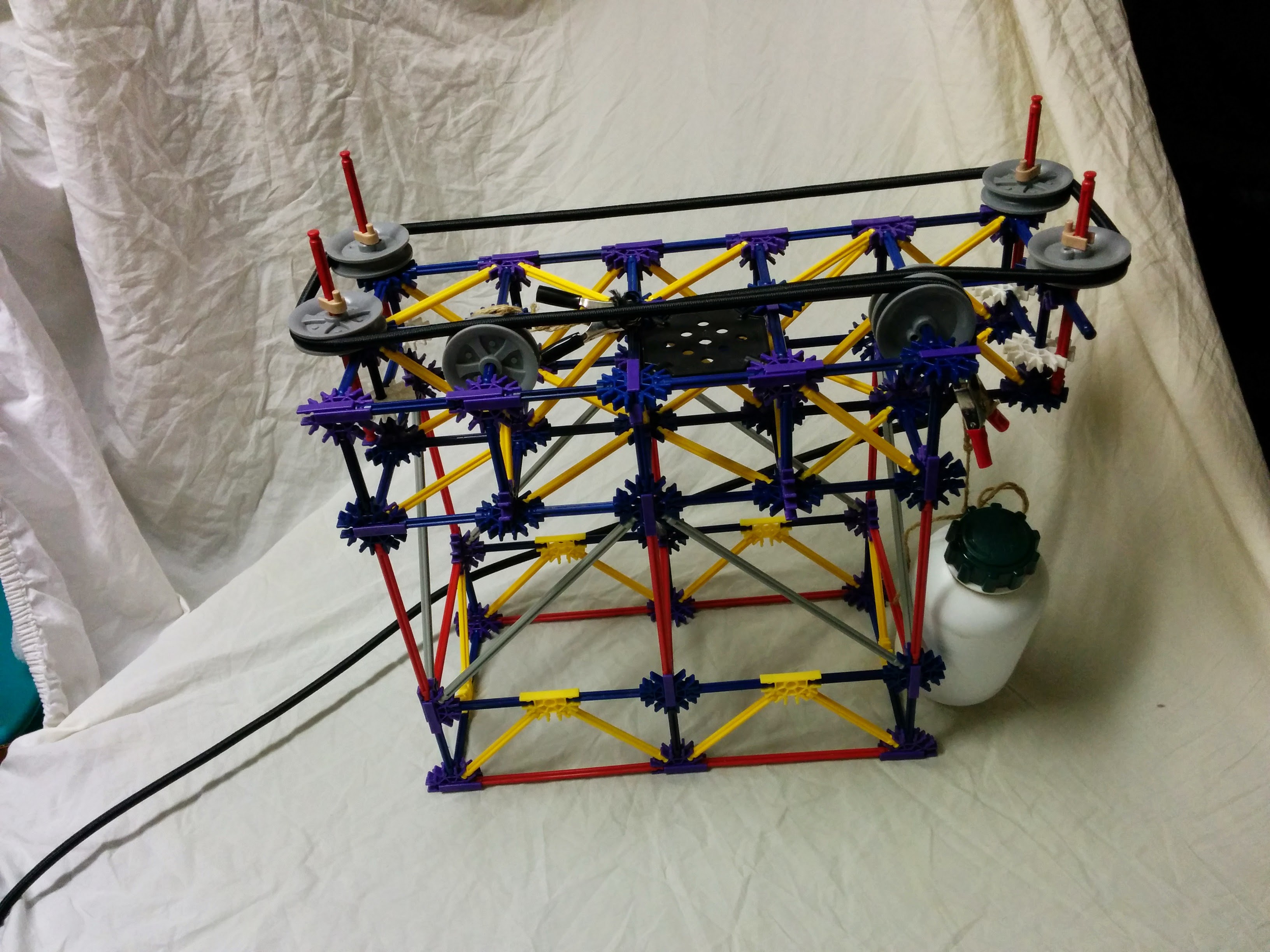Photo of the jig that was used to ensure all bungee cord
              loops are the same size.
